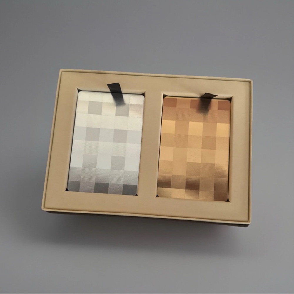 LOUIS VUITTON SUPER RARE SILVER AND GOLD VIP PLAYING CARDS. OPENED BUT NOT USED.